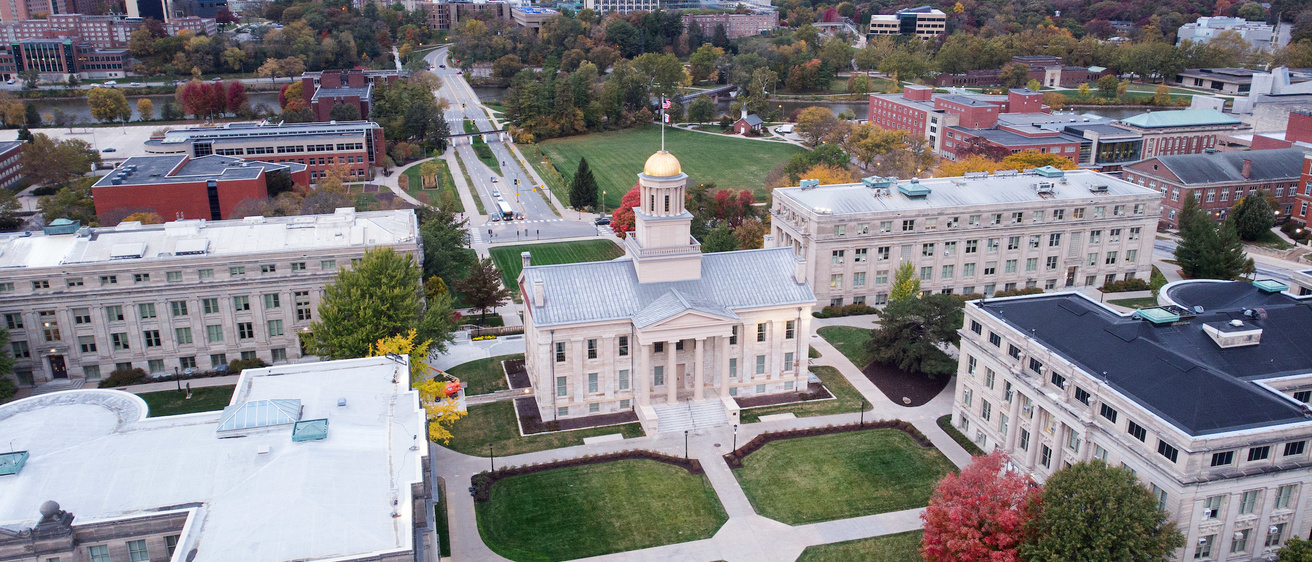 The Pentacrest photographed from the east by drone with the Old Capitol building at the center